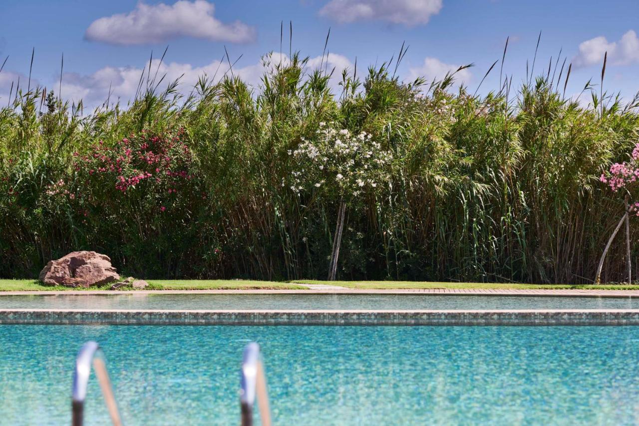 Baia Di Chia Resort Sardinia, Curio Collection By Hilton 외부 사진