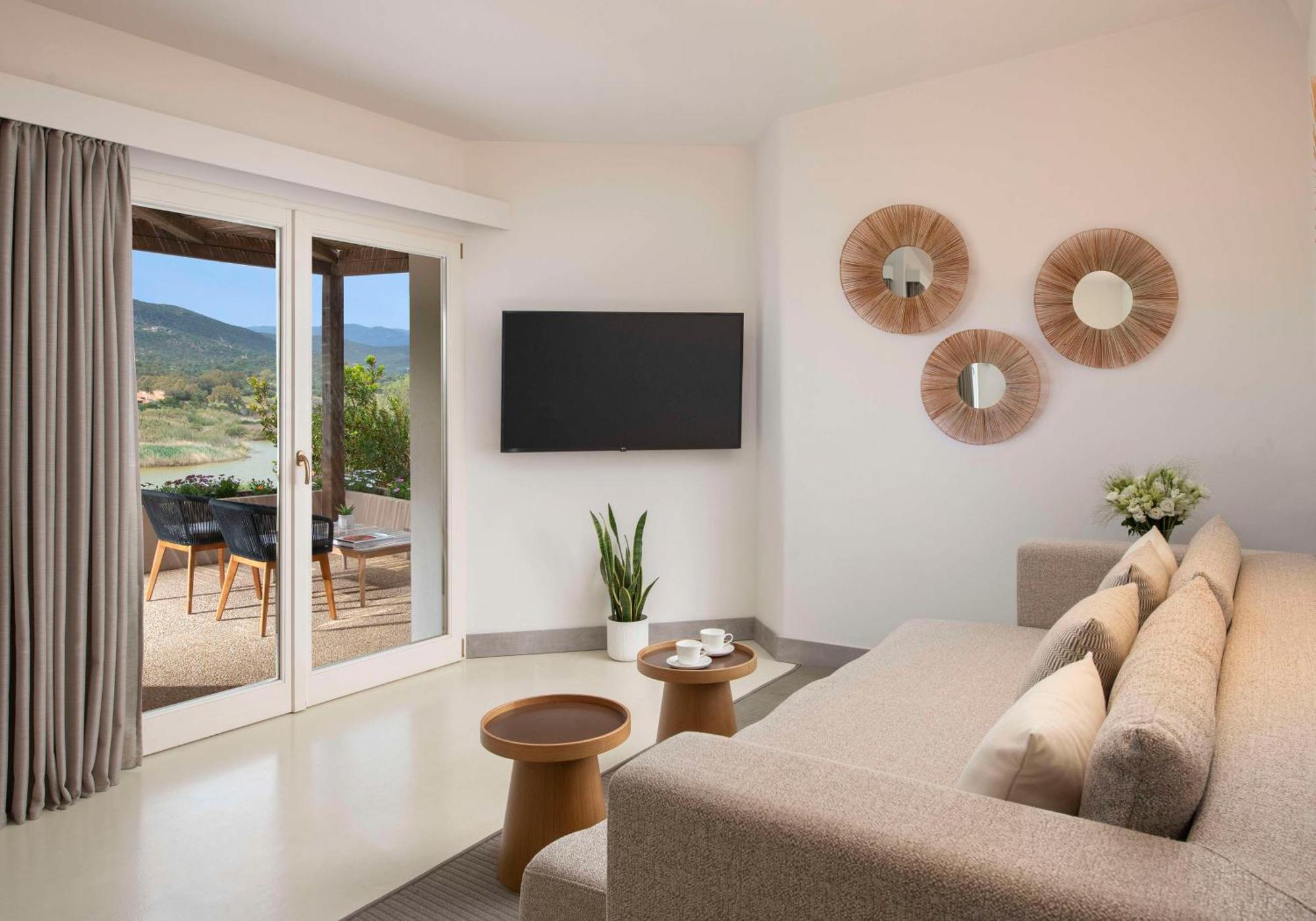 Baia Di Chia Resort Sardinia, Curio Collection By Hilton 외부 사진